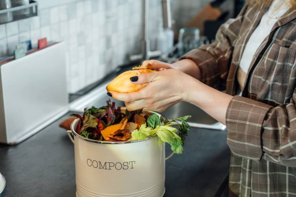 compost kitchen waste recycling at home woman pu 2025 08 11 14 40 54 utc 1