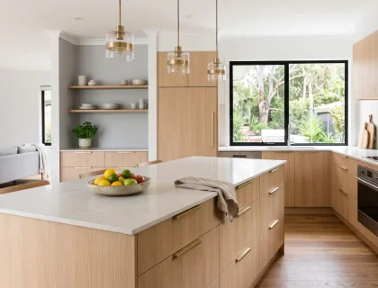 Modern Australian kitchen renovation with island bench, timber cabinetry and porcelain benchtop